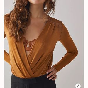 Free people burnt Orange bodysuit size small